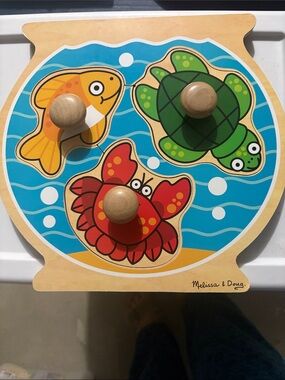 Melissa & Doug Wooden Fishbowl Peg Puzzle - Red, Green, Yellow, Blue